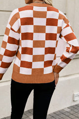 Pull orange à carreaux et bords côtelés *