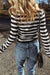 High collar knit sweater and black striped slim cutting