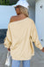 Beige sweatshirt with buttoned sleeves and dropped shoulders