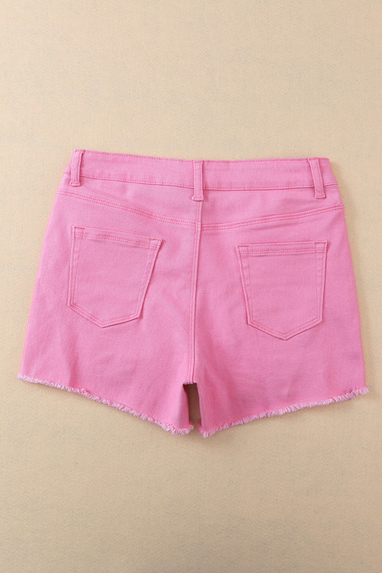 Solid color pink distressed denim shorts