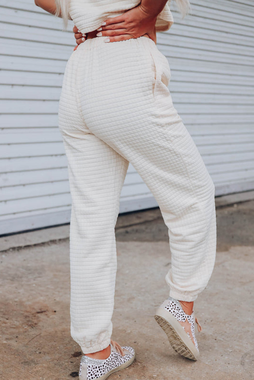 Set di pantaloni a corto e jogger teti di reticolo bianco