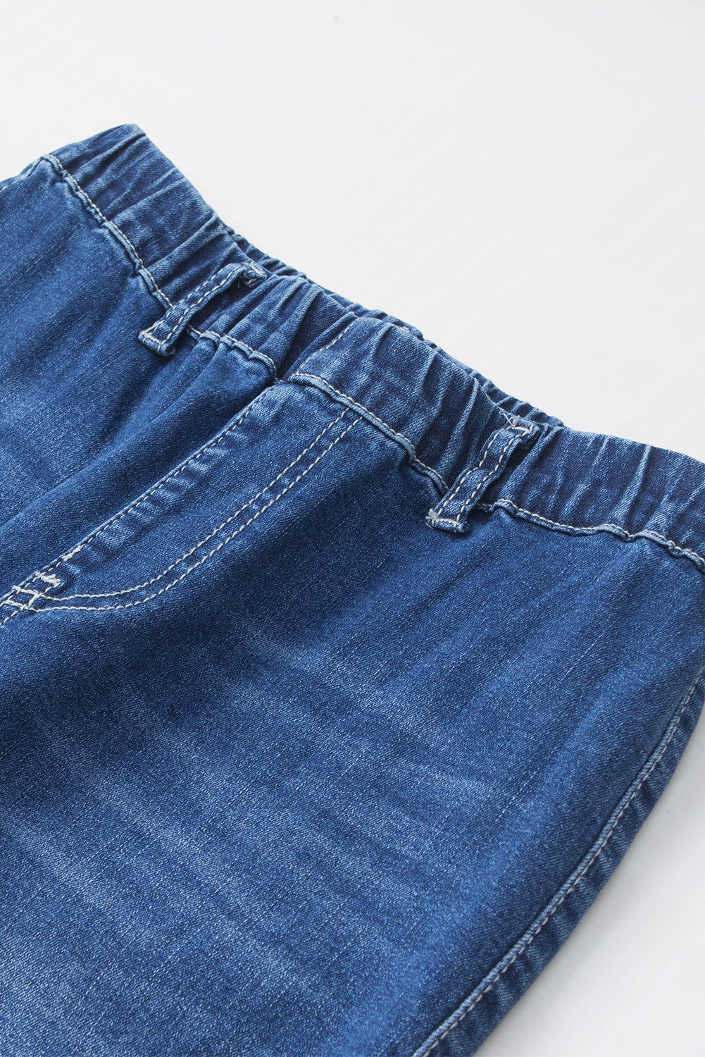 Jeans a bagliore a vita alta elastica blu