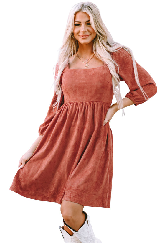 Brown suede dress with square neck and puffed sleeves