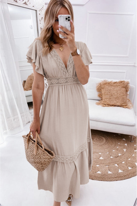 Lace empire waist dress with v-neck and ruffled sleeves