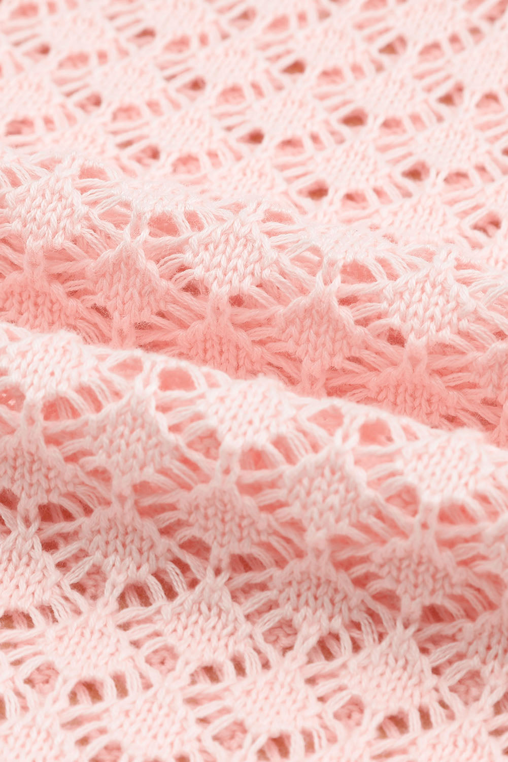 Rosa lose Pointeelle strickte gerippte V -Nackenpullover