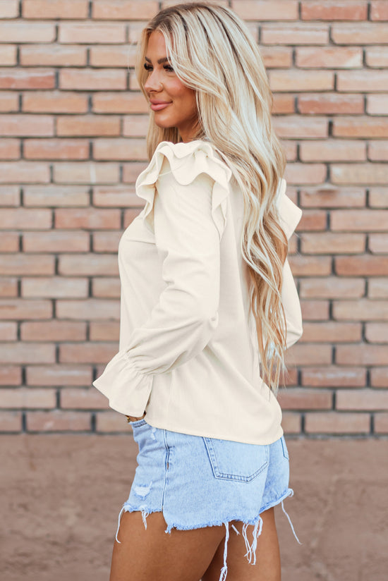 Beige ribbed velvet blouse with ruffles and ruffle sleeves