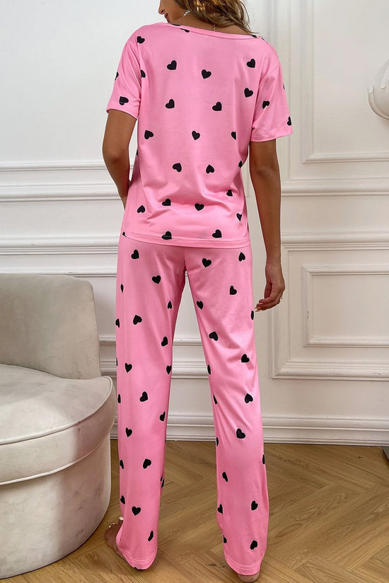 Juego de relajación rosa con camiseta y pantalones con estampado de corazón para el Día de San Valentín