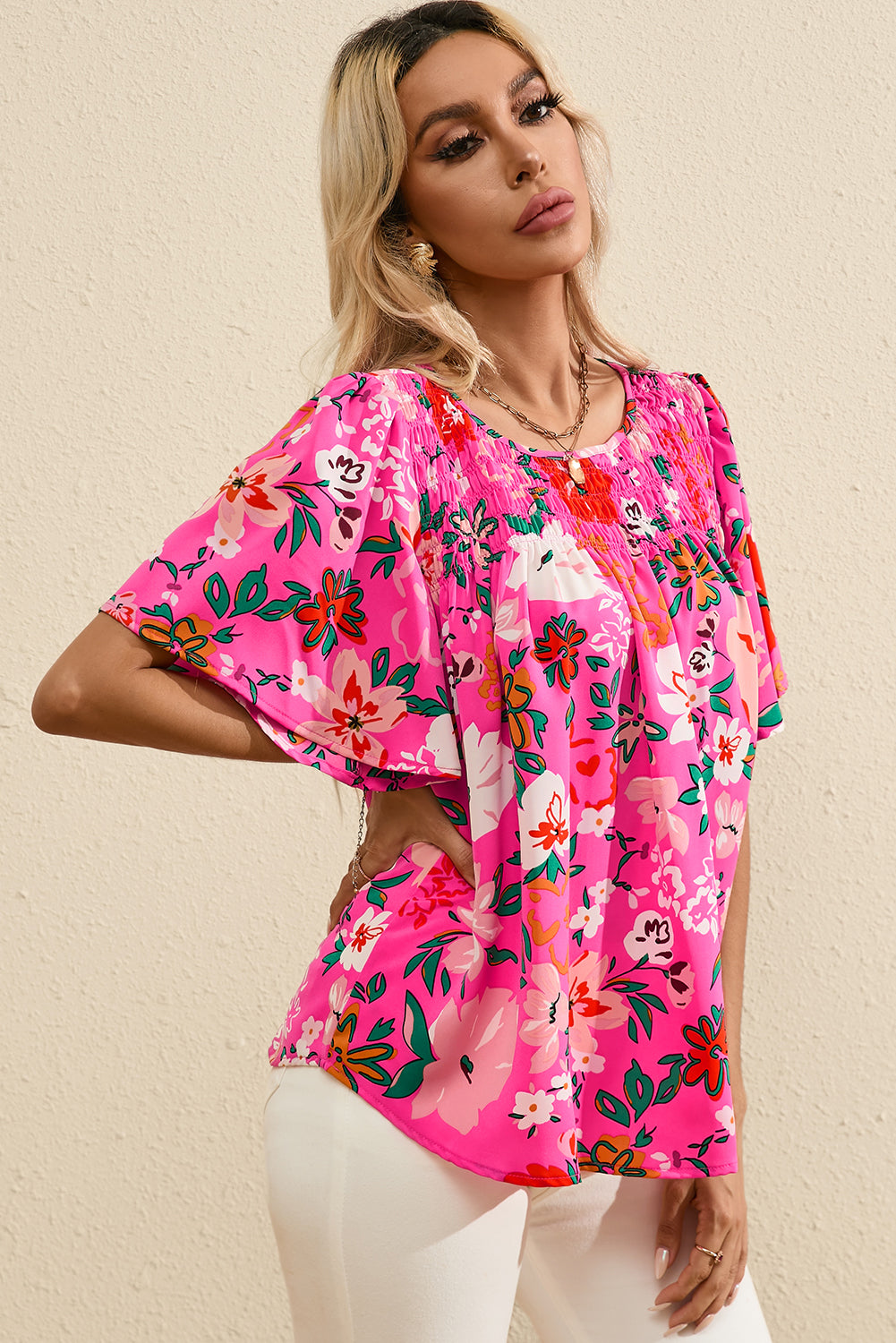 Blusa de smaclada de manga corta de manga floral rosa