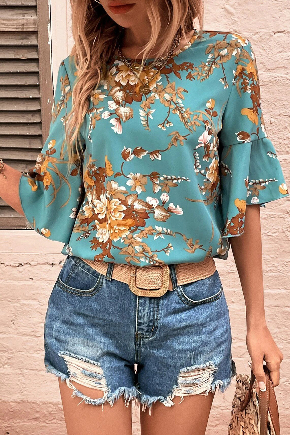 Blusa floral de manga de bengala azul mineral