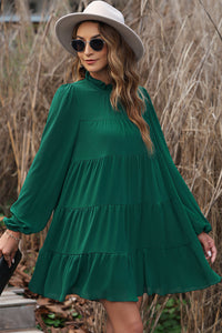 Green dress with ruffles and puffy sleeves *