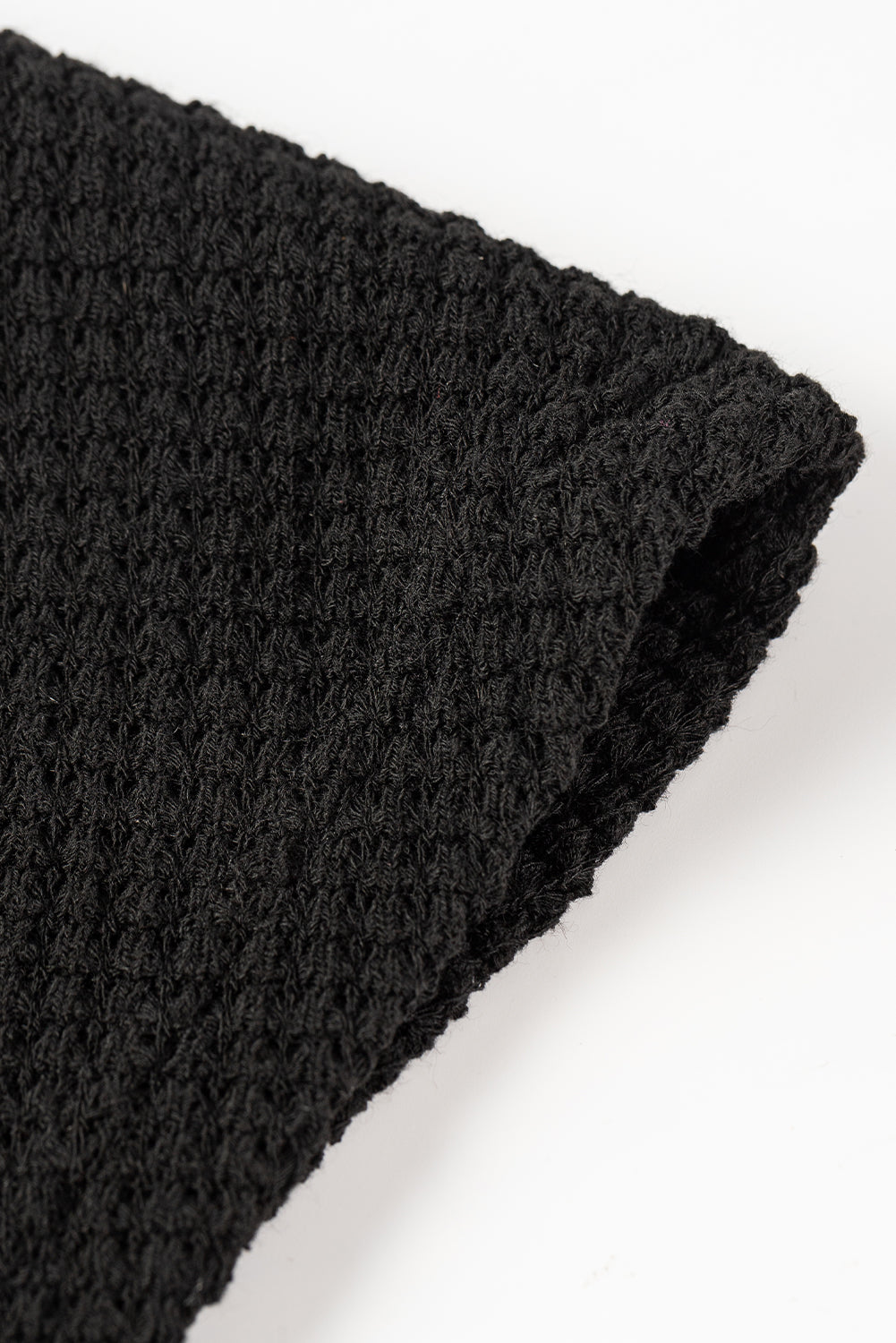 Open-drained black textured t-shirt