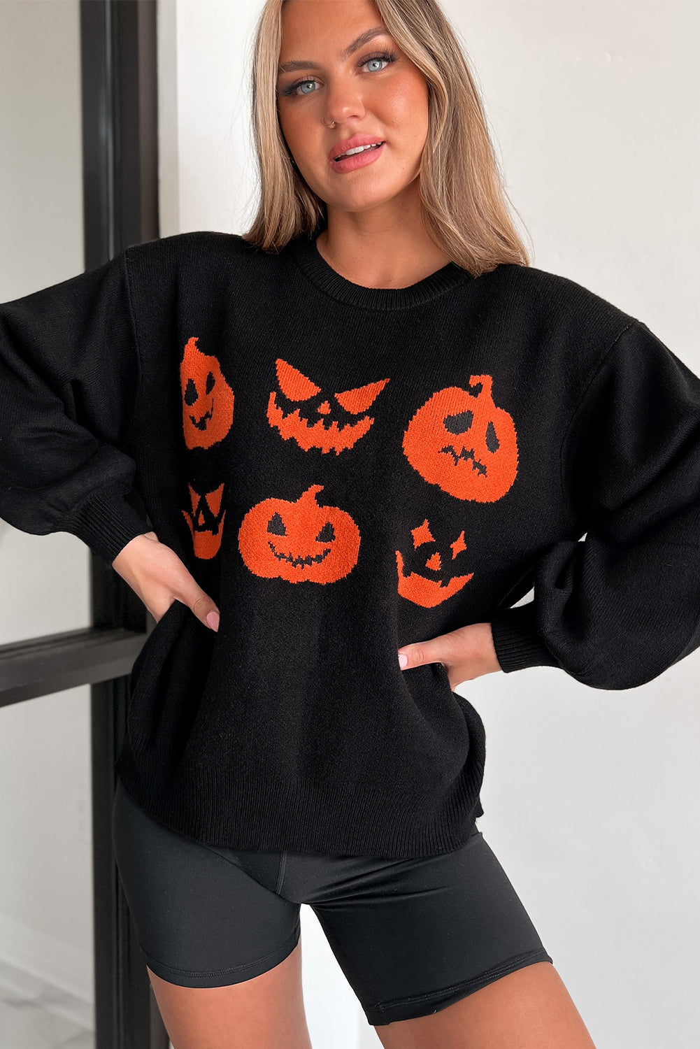 Black shoulder sweater and Halloween pumpkin face pattern