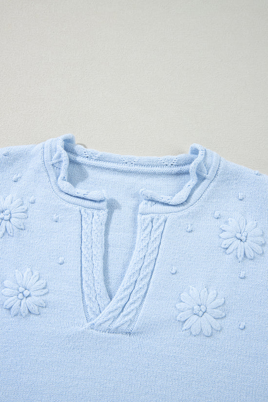 Knitted sweater with notched neck and flower details *