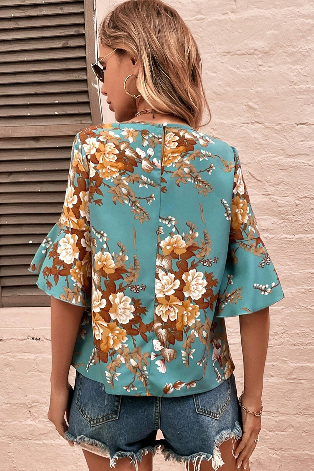 Blusa floral de manga de bengala azul mineral