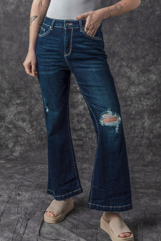 High -waisted jeans torn high and blue sarcelle blue bell real