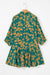 Short fluid dress tunic with green floral print tightening