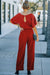 Bright red belted wide leg jumpsuit