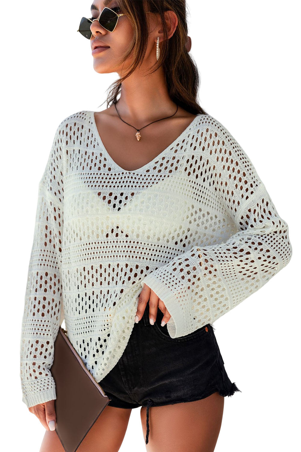 Pull blanc à col en V et crochet ajouré