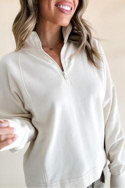 White zip-up sweatshirt with dropped shoulders