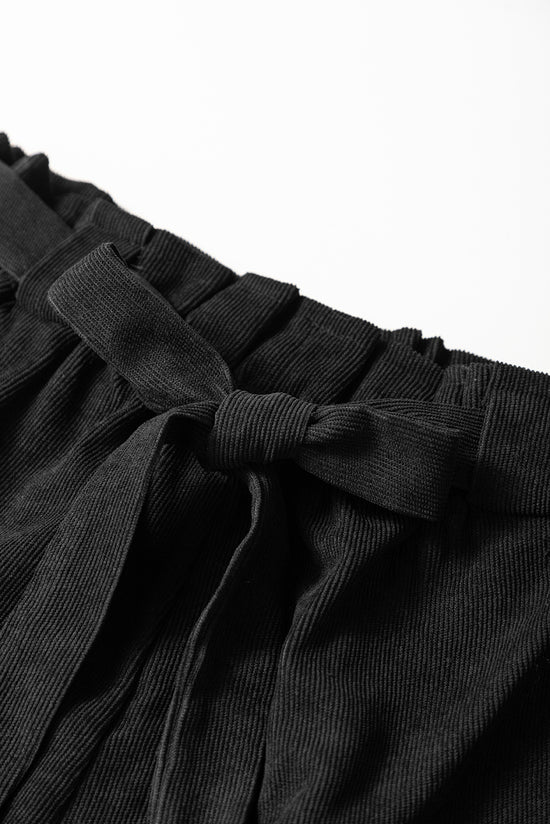 Pantalones cortos de punto de algodón negro con bolsillos