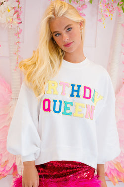 White sweatshirt with balloon sleeves and BIRTHDAY QUEEN print