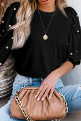 Black top with mid-long puffing sleeves with pearls and rhinestones