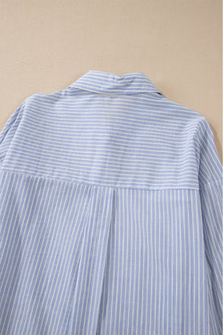 Long sleeve shirt buttoned with sky blue striped