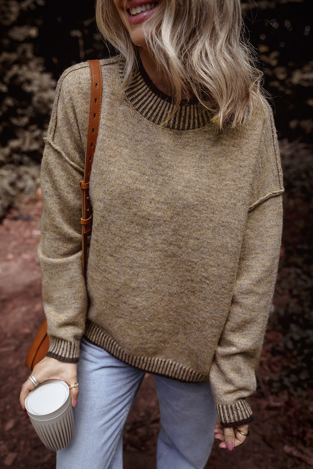 Pale khaki sweater with dropped shoulders and high neck with contrasting trim