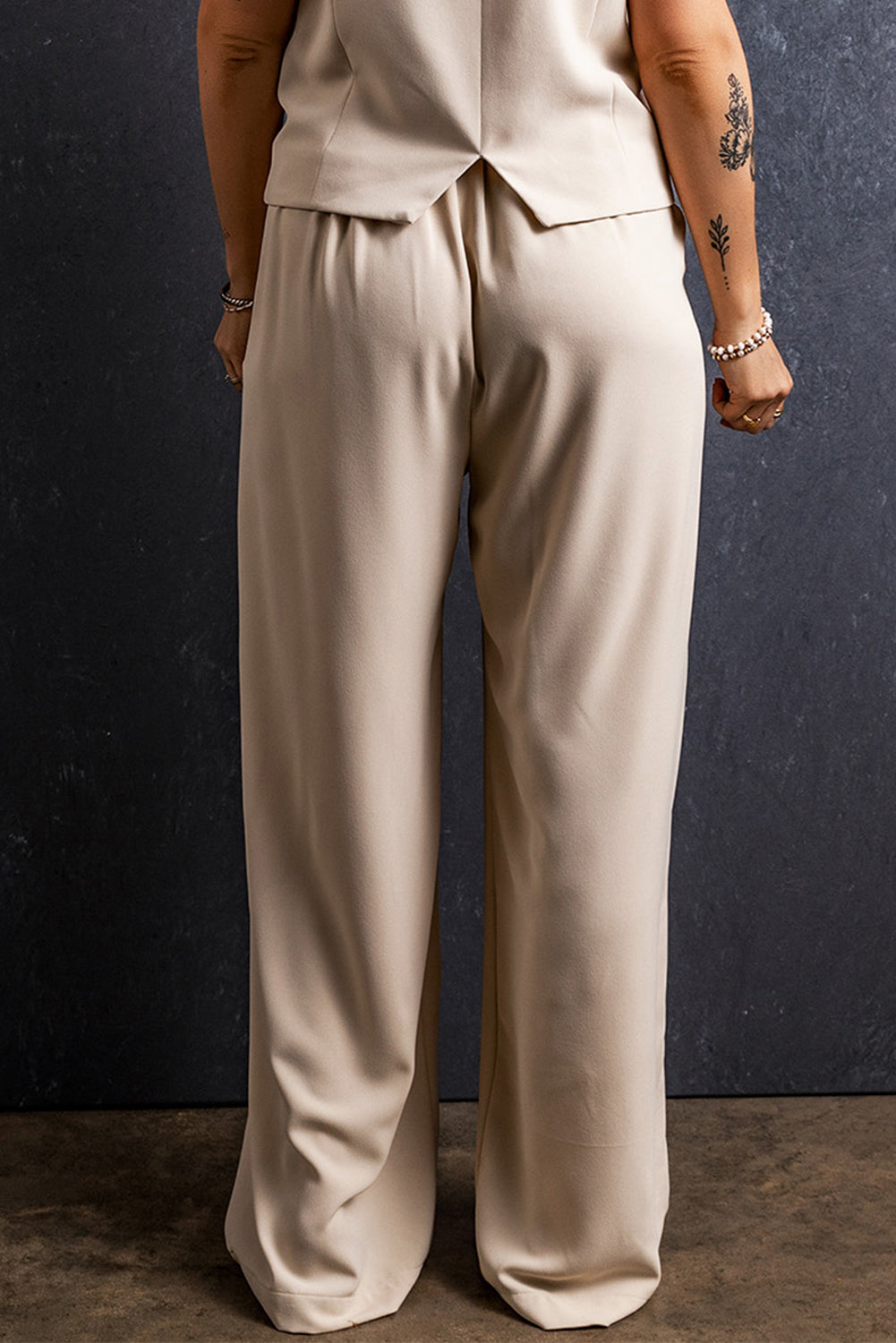 Pantalones anchos plisados ​​con cintura elástica albaricoque