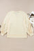 Apricot long sleeve top with notched neckline and exposed seams