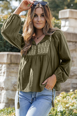 Ample pleated blouse with split and green spokes