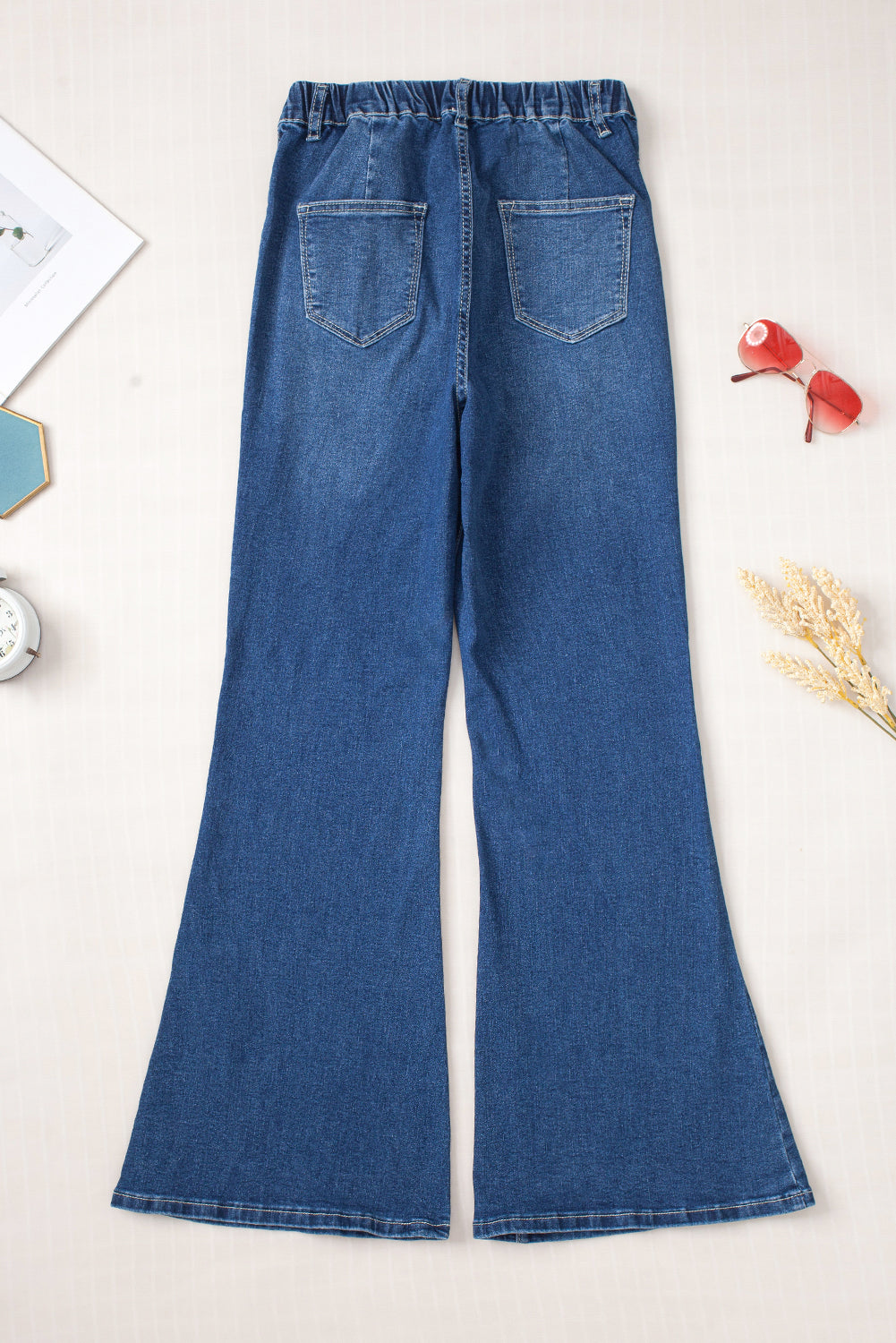 Jeans a bagliore a vita alta elastica blu