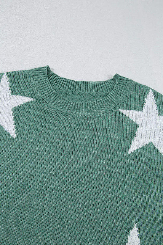 Pull vert à épaules tombantes et motif d'étoiles