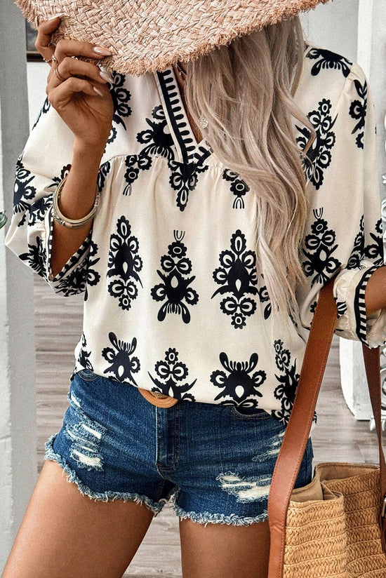 Beige blouse with vintage geometric print *