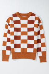 Pull orange à carreaux et bords côtelés *