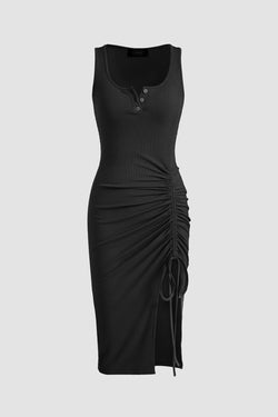 Black ribbed midi dress split on the side and gathered with tightening cord