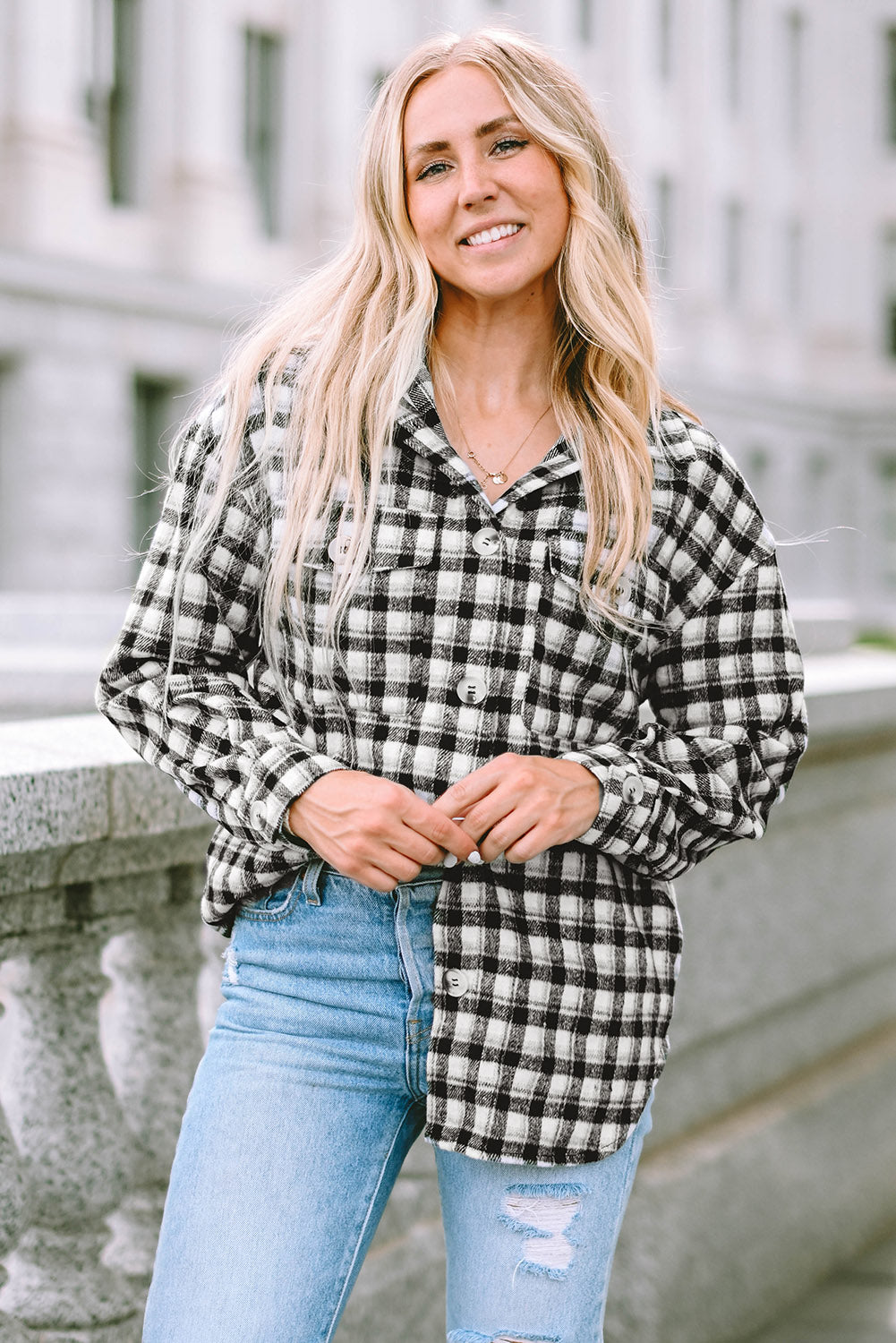 Veste tunique boutonnée noire à imprimé écossais avec poches poitrine