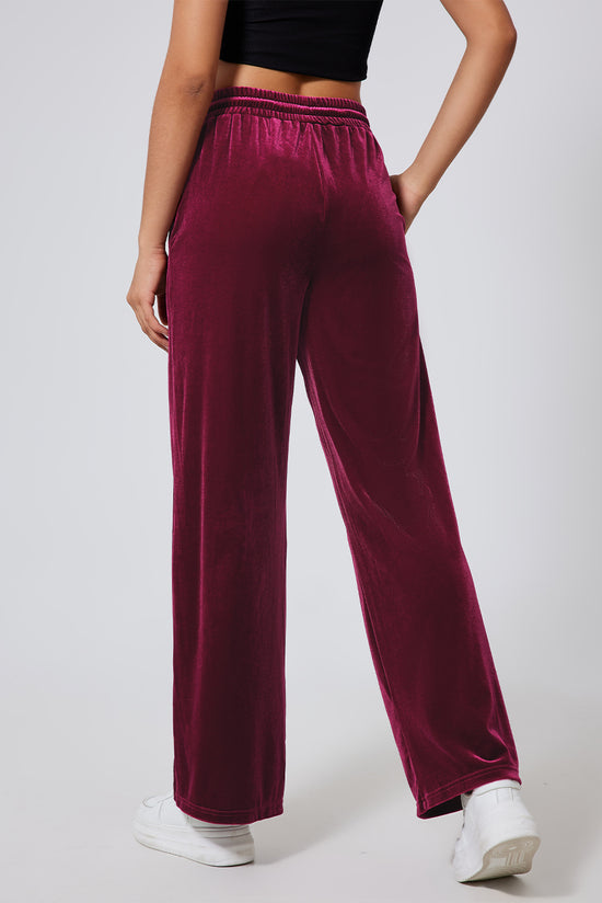 Large burgundy pants with size with tightening cord