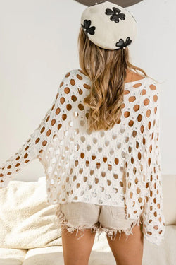 Pull beige en tricot à œillets ajourés