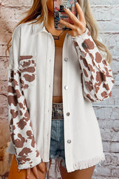 Long denim jacket with flap pocket and distressed hem, white cow spot