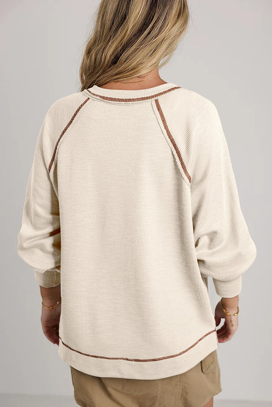 High beige sweater in textured knit *