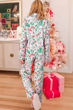 Ensemble pyjama rose à manches longues en satin à imprimé plantes et baies de Noël