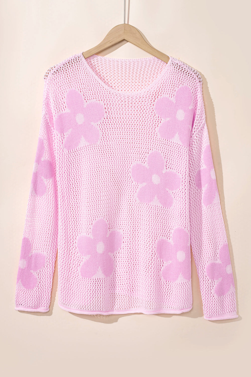 Pull rose clair à épaules tombantes en tricot ajouré à grandes fleurs