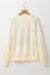 White crew neck sweatshirt with dropped shoulders in color block patchwork