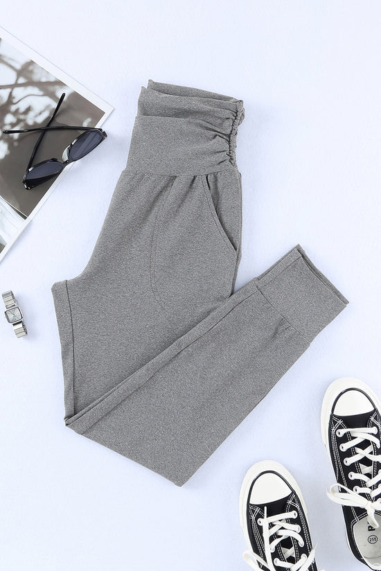 Grey high waisted leggings with pleated pocket