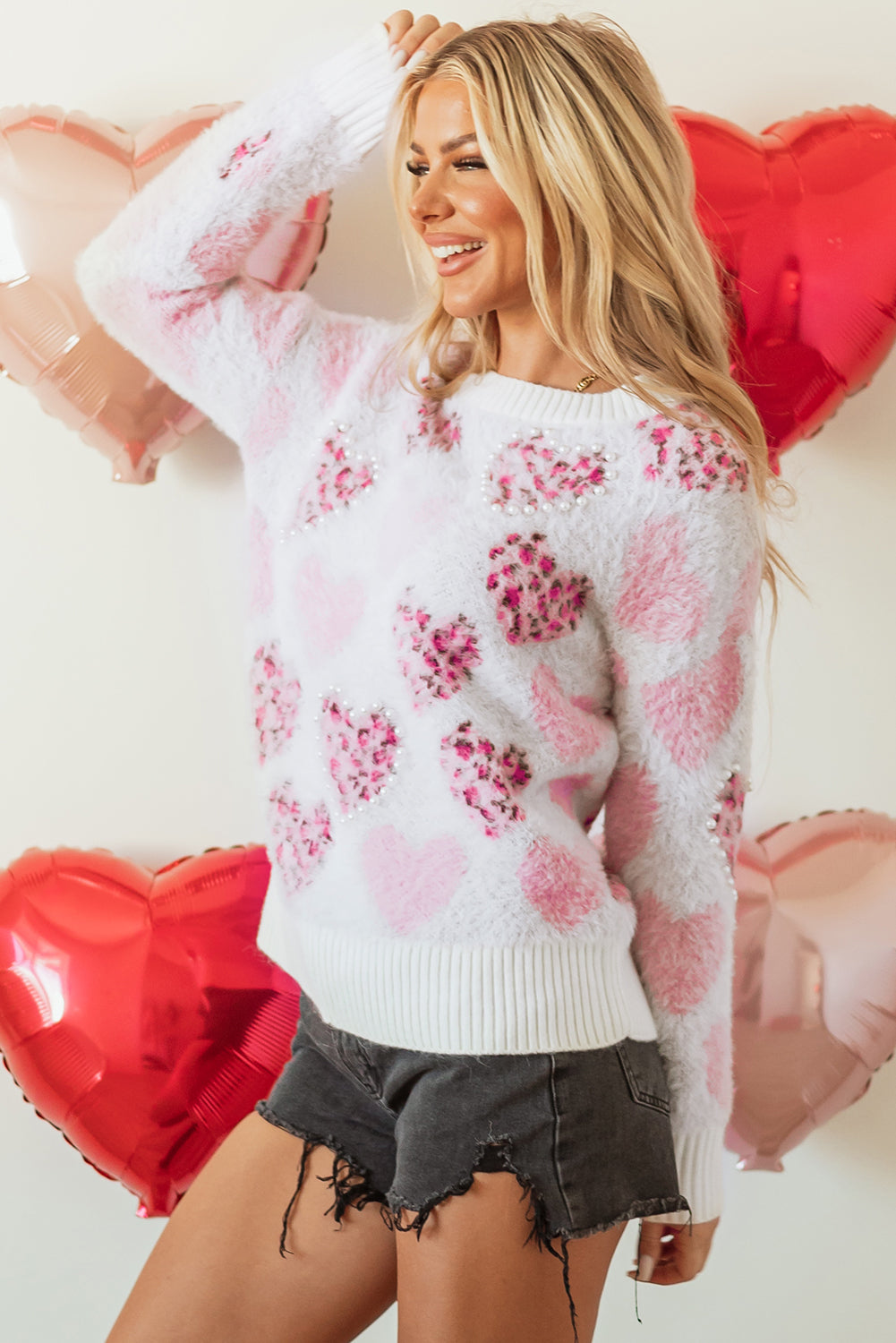 Fluffy sweater with pearl ribbed trim and leopard print and pink heart