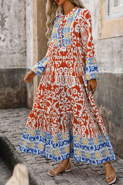 Vestido largo naranja con mangas largas y estampado geométrico boho