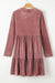 Textured velvet dress on several pale chestnut levels with long sleeves