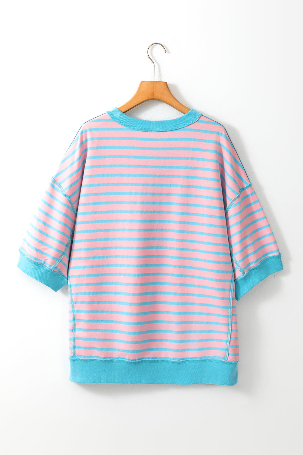 T-shirt up and down with pink stripes, oversized, contrasting border, exposed seams