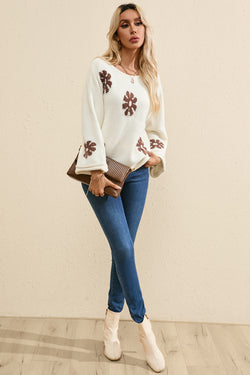 White round-neck sweater with color block floral pattern